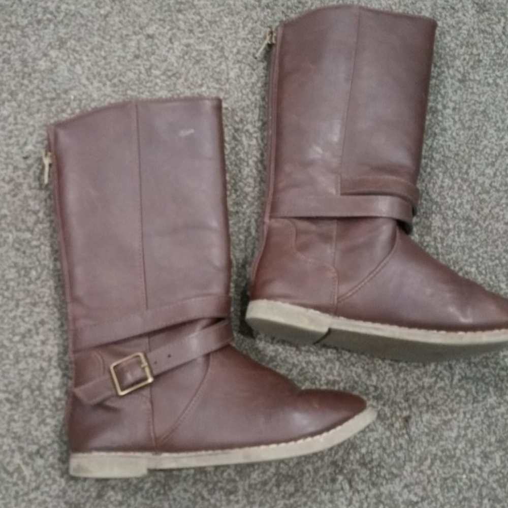 Two pairs of boots and one pair of mary janes